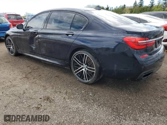 2016 BMW 7 Series 750i xDrive с VIN WBA7F2C57GG419106, выставлен на аукционе Copart как лот 61782145 с пробегом 90 194 миль миль и Чистый • Clean title. История ставок и продаж доступна на DreamBid. Изображение 2.