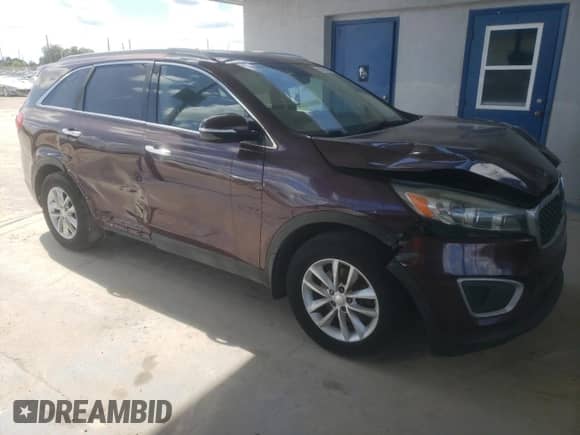 2018 Kia Sorento L z VIN 5XYPG4A37JG406346, wystawiony jako Copart lot #85595685 z przebiegiem 96 487 mil mil oraz Czysty tytuł • Clean title. Historia ofert i sprzedaży dostępna na DreamBid. Obrazek 4.