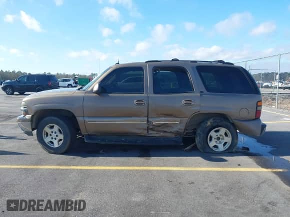 2004 Chevrolet Tahoe LT с VIN 1GNEC13Z24J170834, выставлен на аукционе IAAI как лот 41149637 с пробегом 362 679 миль миль и . История ставок и продаж доступна на DreamBid. Изображение 14.