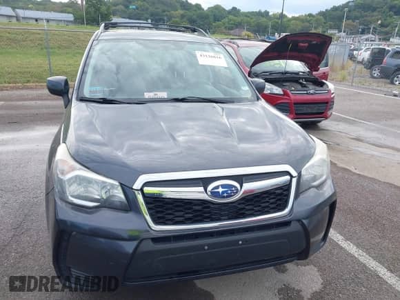 2014 Subaru Forester XT Premium with VIN JF2SJGDC1EH504103, listed as a IAAI auction lot 43126816 with 181,812 mi miles and . Bid and sale history available at DreamBid. Image 12.