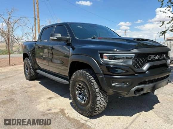 2021 Ram 1500 TRX с VIN 1C6SRFU9XMN902178, выставлен на аукционе Copart как лот 71024015 с пробегом 73 598 миль миль и Чистый • Clean title. История ставок и продаж доступна на DreamBid. Изображение 1.