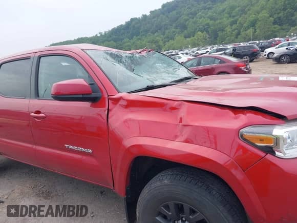 2021 Toyota Tacoma SR5 z VIN 3TYDZ5BN1MT002232, wystawiony jako IAAI lot #42374170 z przebiegiem 16 465 mil mil oraz . Historia ofert i sprzedaży dostępna na DreamBid. Obrazek 17.
