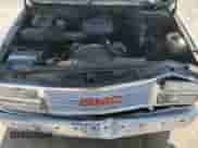 1993 GMC Sierra 1500 z VIN 2GDEC19K6P1529048, wystawiony jako Copart lot #64515825 z przebiegiem 125 941 mil mil oraz Szkoda całkowita • Salvage title. Historia ofert i sprzedaży dostępna na DreamBid. Obrazek 11.
