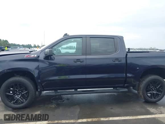 2024 Chevrolet Silverado 1500 LT Trail Boss with VIN 3GCUDFED9RG415847, listed as a IAAI auction lot 43342787 with 7,479 mi miles and . Bid and sale history available at DreamBid. Image 15.