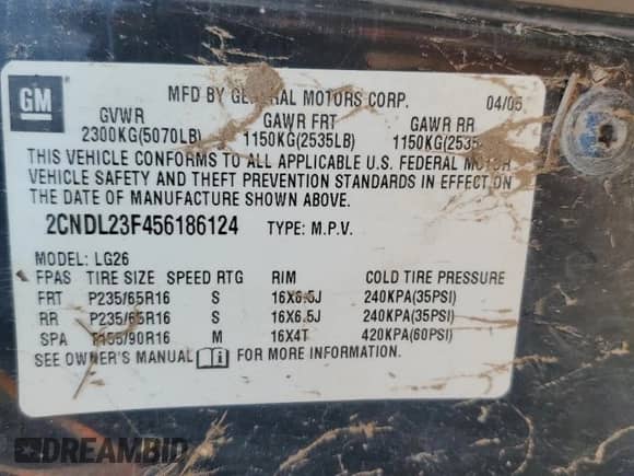 2005 Chevrolet Equinox LS z VIN 2CNDL23F456186124, wystawiony jako Copart lot #69178434 z przebiegiem Nie podano mil oraz Szkoda całkowita • Salvage title. Historia ofert i sprzedaży dostępna na DreamBid. Obrazek 13.