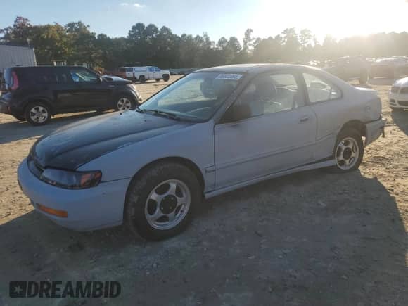 1997 Honda Accord EX with VIN 1HGCD726XVA022411, listed as a Copart auction lot 86822095 with 193,324 mi miles and Salvage title. Bid and sale history available at DreamBid. Image 1.