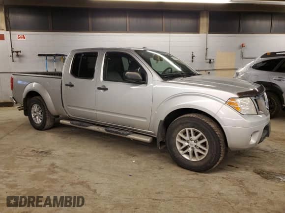 2015 Nissan Frontier SV с VIN 1N6AD0FV1FN703126, выставлен на аукционе Copart как лот 43770995 с пробегом 218 734 миль миль и Списание • Salvage title. История ставок и продаж доступна на DreamBid. Изображение 4.