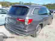 2018 Honda Pilot Elite with VIN 5FNYF6H06JB025867, listed as a IAAI auction lot 43524597 with 94,479 mi miles and . Bid and sale history available at DreamBid. Image 4.