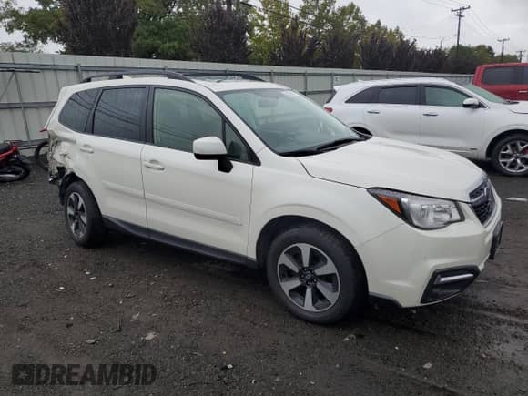 2018 Subaru Forester Premium z VIN JF2SJAEC7JH516178, wystawiony jako Copart lot #83781815 z przebiegiem 77 099 mil mil oraz Szkoda całkowita • Salvage title. Historia ofert i sprzedaży dostępna na DreamBid. Obrazek 4.