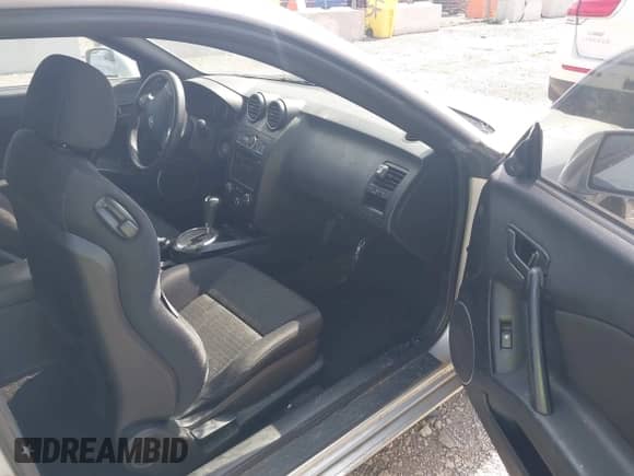 2008 Hyundai Tiburon GS с VIN KMHHM66D98U292719, выставлен на аукционе IAAI как лот 42559802 с пробегом 139 376 миль миль и . История ставок и продаж доступна на DreamBid. Изображение 5.