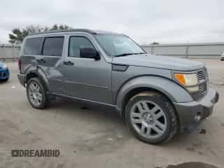 2011 Dodge Nitro Heat with VIN 1D4PT4GK9BW601852, listed as a Copart auction lot 71261794 with 162,215 mi miles and Salvage title. Bid and sale history available at DreamBid. Image 4.