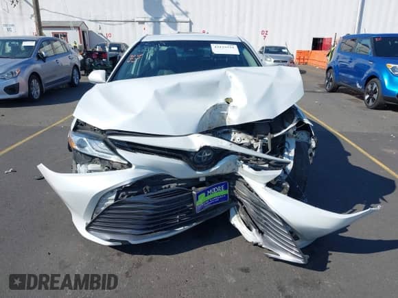 2020 Toyota Camry Hybrid XLE z VIN 4T1F31AK1LU541672, wystawiony jako IAAI lot #43125531 z przebiegiem 207 911 mil mil oraz . Historia ofert i sprzedaży dostępna na DreamBid. Obrazek 12.