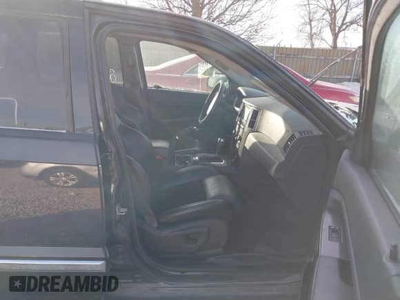 2009 Jeep Grand Cherokee with VIN 1J8HR78W29C541579, listed as a IAAI auction lot 41246215 with 68,031 mi miles and . Bid and sale history available at DreamBid. Image 5.