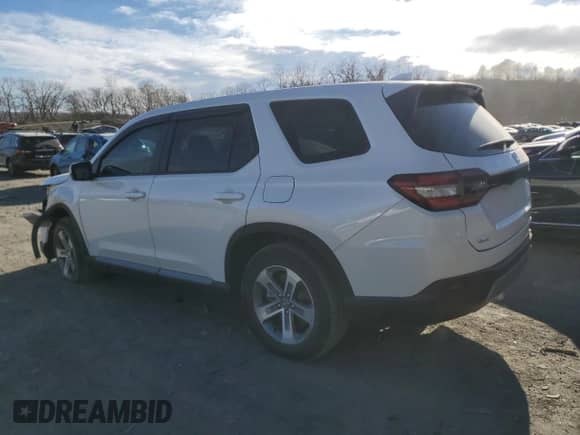 2024 Honda Pilot EX-L with VIN 5FNYG1H52RB049090, listed as a Copart auction lot 41562695 with 9,939 mi miles and Salvage title. Bid and sale history available at DreamBid. Image 2.