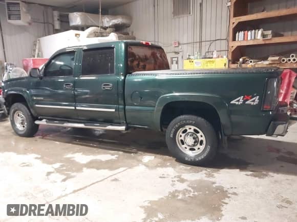 2003 Chevrolet Silverado 1500HD LS z VIN 1GCGK13U63F226607, wystawiony jako IAAI lot #41178194 z przebiegiem 158 193 mil mil oraz . Historia ofert i sprzedaży dostępna na DreamBid. Obrazek 3.