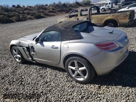 2007 Saturn Sky with VIN 1G8MB35B47Y101765, listed as a Copart auction lot 68054344 with 82,064 mi miles and Salvage title. Bid and sale history available at DreamBid. Image 2.