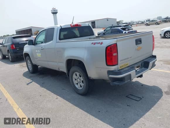 2018 Chevrolet Colorado 4WD Work Truck z VIN 1GCHTBEN4J1234714, wystawiony jako IAAI lot #42399979 z przebiegiem 166 408 mil mil oraz . Historia ofert i sprzedaży dostępna na DreamBid. Obrazek 3.