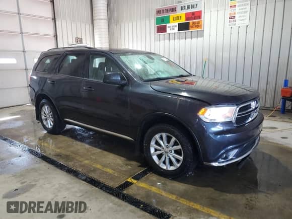 2015 Dodge Durango SXT z VIN 1C4RDJAG8FC861172, wystawiony jako Copart lot #81070265 z przebiegiem 209 038 mil mil oraz Szkoda całkowita • Salvage title. Historia ofert i sprzedaży dostępna na DreamBid. Obrazek 4.