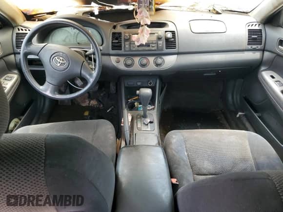 2002 Toyota Camry LE с VIN 4T1BE32K92U502491, выставлен на аукционе Copart как лот 89493885 с пробегом Не указан миль и Списание • Salvage title. История ставок и продаж доступна на DreamBid. Изображение 8.