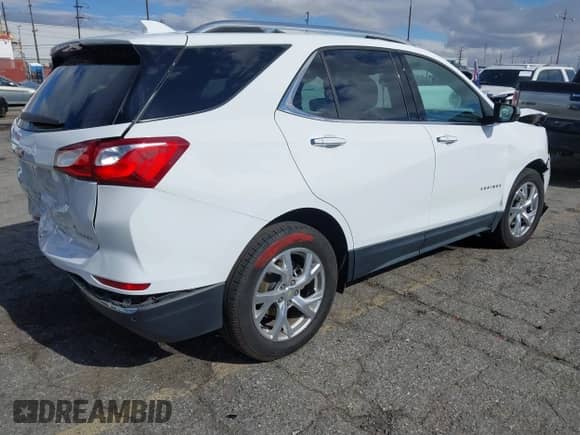 2020 Chevrolet Equinox Premier с VIN 2GNAXXEV6L6215561, выставлен на аукционе IAAI как лот 41345441 с пробегом 54 976 миль миль и . История ставок и продаж доступна на DreamBid. Изображение 4.