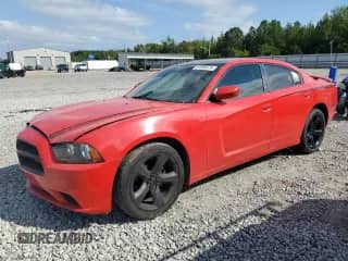 2014 Dodge Charger SXT with VIN 2C3CDXHG5EH333975, listed as a Copart auction lot 81995475 with 165,528 mi miles and Salvage title. Bid and sale history available at DreamBid. Image 1.