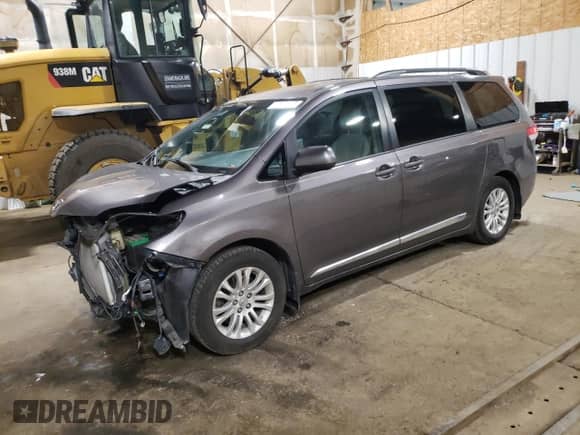 2012 Toyota Sienna XLE AAS с VIN 5TDYK3DC6CS255997, выставлен на аукционе Copart как лот 81259665 с пробегом 153 058 миль миль и Списание • Salvage title. История ставок и продаж доступна на DreamBid. Изображение 1.
