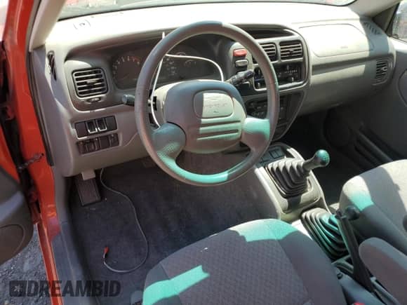 2002 Chevrolet Tracker с VIN 2CNBJ18C126919389, выставлен на аукционе Copart как лот 59916845 с пробегом Не указан миль и Списание • Salvage title. История ставок и продаж доступна на DreamBid. Изображение 8.
