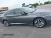 2019 Honda Accord with VIN 1HGCV3F17KA019711, listed as a IAAI auction lot 42382585 with 88,945 mi miles and . Bid and sale history available at DreamBid. Image 13.