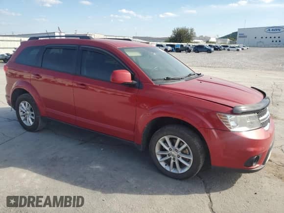 2016 Dodge Journey SXT with VIN 3C4PDCBG9GT165735, listed as a Copart auction lot 84241435 with 167,635 mi miles and Salvage title. Bid and sale history available at DreamBid. Image 4.