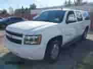 2010 Chevrolet Suburban LT z VIN 1GNUCJE05AR210539, wystawiony jako IAAI lot #41805107 z przebiegiem 166 305 mil mil oraz . Historia ofert i sprzedaży dostępna na DreamBid. Obrazek 2.