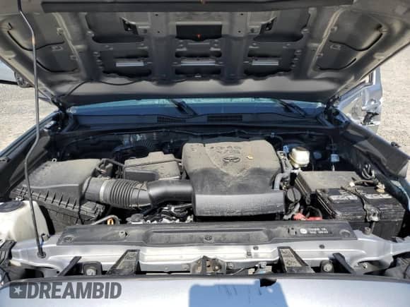 2019 Toyota Tacoma SR5 z VIN 5TFSZ5AN7KX184658, wystawiony jako Copart lot #71963065 z przebiegiem 32 476 mil mil oraz Szkoda całkowita • Salvage title. Historia ofert i sprzedaży dostępna na DreamBid. Obrazek 11.