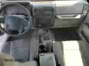 2004 Jeep Wrangler Sahara с VIN 1J4FA59S94P717464, выставлен на аукционе Copart как лот 66406845 с пробегом 171 731 миль миль и Чистый • Clean title. История ставок и продаж доступна на DreamBid. Изображение 8.