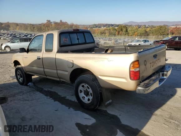 1997 Toyota Tacoma z VIN 4TAWM72N3VZ308584, wystawiony jako Copart lot #76939654 z przebiegiem 259 695 mil mil oraz Szkoda całkowita • Salvage title. Historia ofert i sprzedaży dostępna na DreamBid. Obrazek 2.