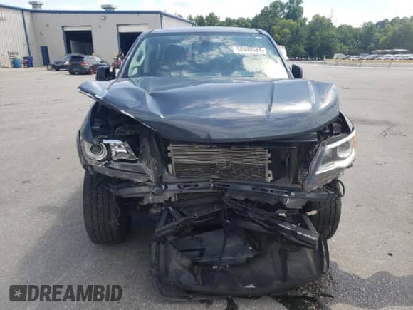 2020 Chevrolet Colorado 4WD Z71 with VIN 1GCGTDEN1L1161201, listed as a Copart auction lot 58840584 with 60,456 mi miles and Salvage title. Bid and sale history available at DreamBid. Image 5.