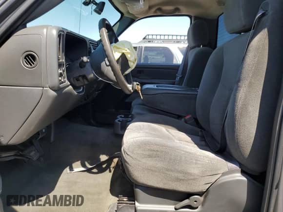 2004 Chevrolet Silverado 1500 LS with VIN 1GCEC14T24Z174421, listed as a Copart auction lot 62887245 with 298,743 mi miles and Salvage title. Bid and sale history available at DreamBid. Image 7.