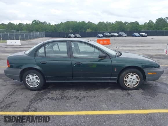 1998 Saturn SL с VIN 1G8ZH5280WZ295857, выставлен на аукционе IAAI как лот 42238789 с пробегом 153 163 миль миль и . История ставок и продаж доступна на DreamBid. Изображение 13.
