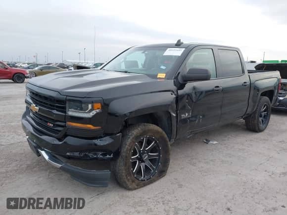 2017 Chevrolet Silverado 1500 LT z VIN 1GCUKREC2HF208232, wystawiony jako IAAI lot #40933445 z przebiegiem 105 928 mil mil oraz . Historia ofert i sprzedaży dostępna na DreamBid. Obrazek 6.