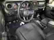 2022 Jeep Wrangler Willys Sport с VIN 1C4GJXAG0NW111202, выставлен на аукционе Copart как лот 79994544 с пробегом 13 885 миль миль и Списание • Salvage title. История ставок и продаж доступна на DreamBid. Изображение 8.