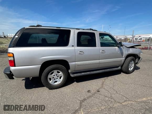 2005 Chevrolet Suburban Z71 with VIN 3GNFK16Z95G199317, listed as a Copart auction lot 68871405 with 157,622 mi miles and Salvage title. Bid and sale history available at DreamBid. Image 3.