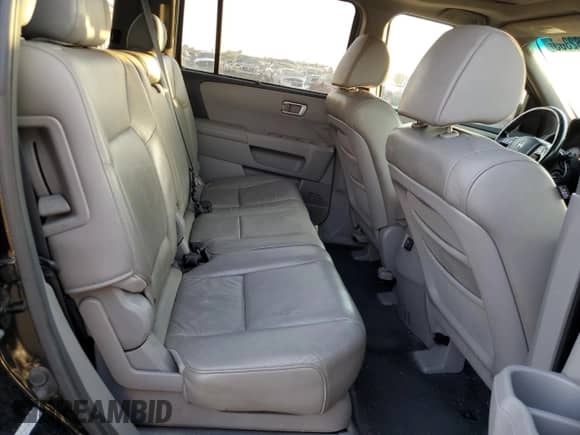 2010 Honda Pilot Touring with VIN 5FNYF4H87AB038749, listed as a Copart auction lot 69882305 with 141,496 mi miles and Salvage title. Bid and sale history available at DreamBid. Image 11.