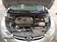 2013 Hyundai Elantra GLS z VIN 5NPDH4AE6DH300890, wystawiony jako IAAI lot #43073166 z przebiegiem 163 666 mil mil oraz . Historia ofert i sprzedaży dostępna na DreamBid. Obrazek 10.