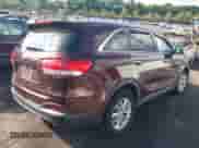 2018 Kia Sorento LX with VIN 5XYPG4A55JG357651, listed as a IAAI auction lot 42650880 with 122,723 mi miles and . Bid and sale history available at DreamBid. Image 4.