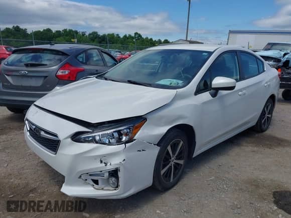 2019 Subaru Impreza Premium with VIN 4S3GKAD60K3617042, listed as a IAAI auction lot 42296679 with 55,522 mi miles and . Bid and sale history available at DreamBid. Image 17.