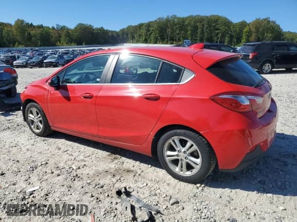 2018 Chevrolet Cruze LT z VIN 3G1BE6SM6JS633666, wystawiony jako Copart lot #81141265 z przebiegiem 130 092 mil mil oraz Szkoda całkowita • Salvage title. Historia ofert i sprzedaży dostępna na DreamBid. Obrazek 2.