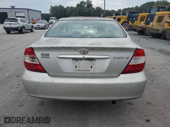 2002 Toyota Camry LE с VIN 4T1BE32K52U555219, выставлен на аукционе Copart как лот 84436005 с пробегом Не указан миль и Списание • Salvage title. История ставок и продаж доступна на DreamBid. Изображение 6.