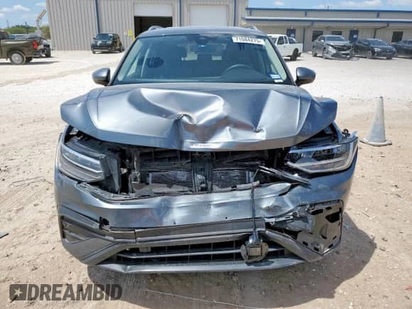 2022 Volkswagen Tiguan SE with VIN 3VV3B7AX1NM118480, listed as a Copart auction lot 71084275 with 21,950 mi miles and Salvage title. Bid and sale history available at DreamBid. Image 5.