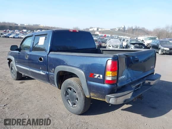 2005 GMC Sierra 1500 SLE with VIN 2GTEK13T151171069, listed as a IAAI auction lot 41803165 with 191,543 mi miles and . Bid and sale history available at DreamBid. Image 3.