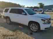 2015 Chevrolet Tahoe Commercial with VIN 1GNSK2ECXFR695889, listed as a Copart auction lot 74369994 with 196,209 mi miles and Salvage title. Bid and sale history available at DreamBid. Image 4.