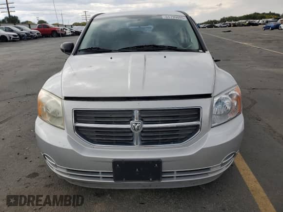 2008 Dodge Caliber SXT with VIN 1B3HB48B38D754624, listed as a Copart auction lot 84799085 with 137,663 mi miles and Salvage title. Bid and sale history available at DreamBid. Image 5.