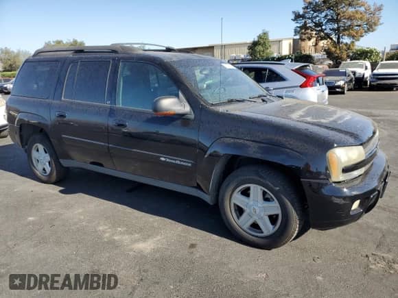 2002 Chevrolet TrailBlazer EXT LT with VIN 1GNET16S126138066, listed as a Copart auction lot 71233215 with 129,681 mi miles and Clean title. Bid and sale history available at DreamBid. Image 4.